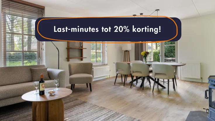 Banner met een woonkamer van een vakantiewoning en de tekst last minutes tot 20 procent korting